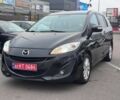 Черный Мазда 5, объемом двигателя 1.8 л и пробегом 171 тыс. км за 11000 $, фото 1 на Automoto.ua