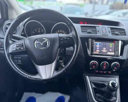 Черный Мазда 5, объемом двигателя 1.8 л и пробегом 171 тыс. км за 11000 $, фото 1 на Automoto.ua