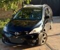 Черный Мазда 5, объемом двигателя 2 л и пробегом 141 тыс. км за 7000 $, фото 1 на Automoto.ua