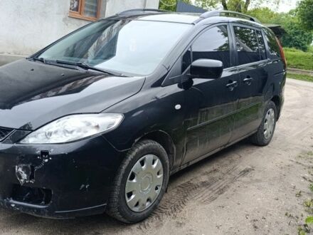 Чорний Мазда 5, об'ємом двигуна 2 л та пробігом 296 тис. км за 4650 $, фото 1 на Automoto.ua