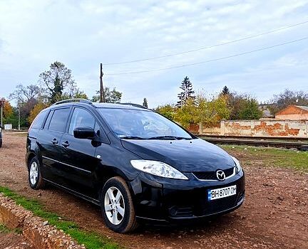Черный Мазда 5, объемом двигателя 1.8 л и пробегом 250 тыс. км за 4500 $, фото 1 на Automoto.ua