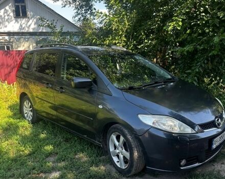 Черный Мазда 5, объемом двигателя 2 л и пробегом 316 тыс. км за 4400 $, фото 1 на Automoto.ua