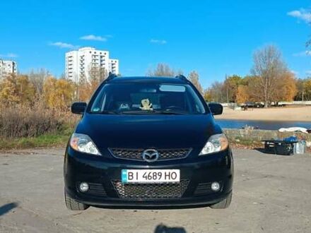Черный Мазда 5, объемом двигателя 2 л и пробегом 218 тыс. км за 5200 $, фото 1 на Automoto.ua
