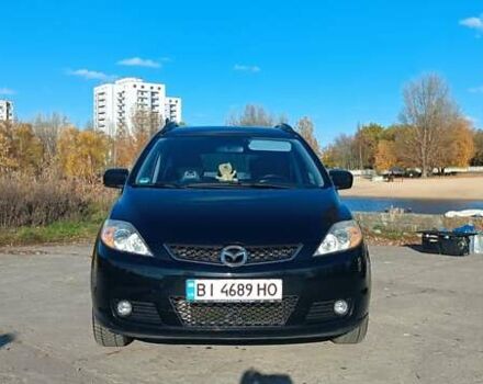 Черный Мазда 5, объемом двигателя 2 л и пробегом 218 тыс. км за 5200 $, фото 1 на Automoto.ua