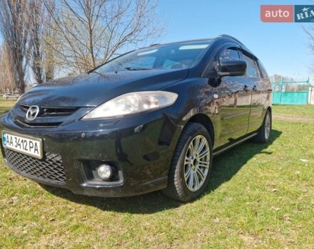 Черный Мазда 5, объемом двигателя 2 л и пробегом 220 тыс. км за 6000 $, фото 1 на Automoto.ua