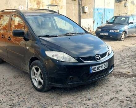 Черный Мазда 5, объемом двигателя 2 л и пробегом 300 тыс. км за 3000 $, фото 1 на Automoto.ua
