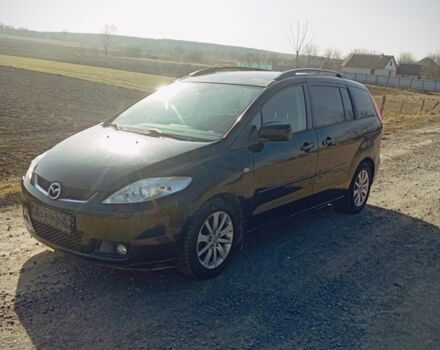 Черный Мазда 5, объемом двигателя 2 л и пробегом 280 тыс. км за 4400 $, фото 1 на Automoto.ua