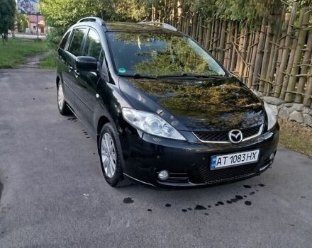 Черный Мазда 5, объемом двигателя 1.8 л и пробегом 318 тыс. км за 4350 $, фото 1 на Automoto.ua