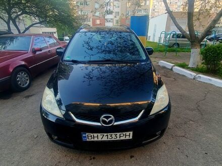 Черный Мазда 5, объемом двигателя 2 л и пробегом 251 тыс. км за 6500 $, фото 1 на Automoto.ua