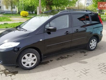 Черный Мазда 5, объемом двигателя 2 л и пробегом 260 тыс. км за 5900 $, фото 1 на Automoto.ua