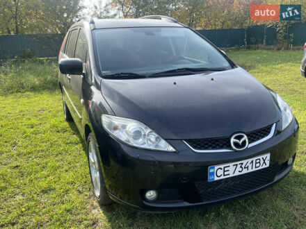 Черный Мазда 5, объемом двигателя 2 л и пробегом 244 тыс. км за 5500 $, фото 1 на Automoto.ua