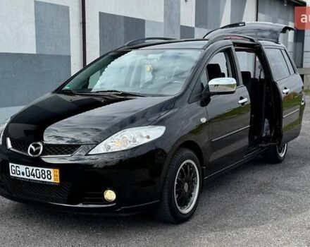 Черный Мазда 5, объемом двигателя 2 л и пробегом 220 тыс. км за 5899 $, фото 1 на Automoto.ua