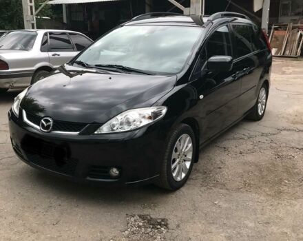 Черный Мазда 5, объемом двигателя 2 л и пробегом 200 тыс. км за 8600 $, фото 1 на Automoto.ua