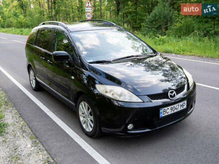 Черный Мазда 5, объемом двигателя 2 л и пробегом 299 тыс. км за 5800 $, фото 1 на Automoto.ua