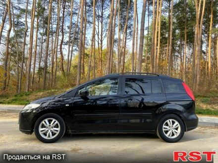 Черный Мазда 5, объемом двигателя 2 л и пробегом 200 тыс. км за 3700 $, фото 1 на Automoto.ua