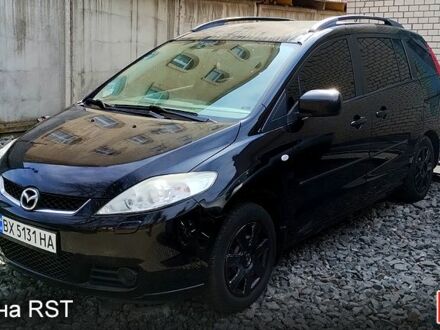 Черный Мазда 5, объемом двигателя 1.8 л и пробегом 250 тыс. км за 5500 $, фото 1 на Automoto.ua