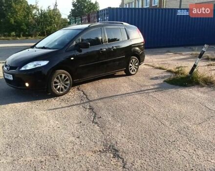 Черный Мазда 5, объемом двигателя 2 л и пробегом 297 тыс. км за 4599 $, фото 1 на Automoto.ua