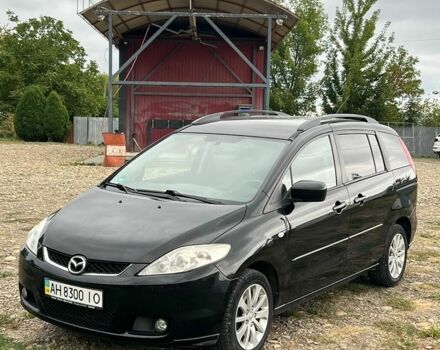Черный Мазда 5, объемом двигателя 2 л и пробегом 250 тыс. км за 4999 $, фото 1 на Automoto.ua