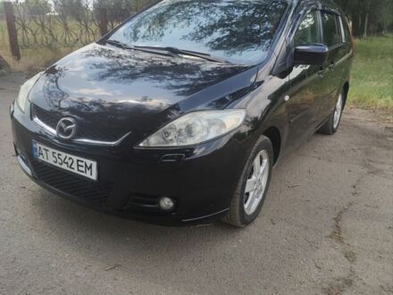 Черный Мазда 5, объемом двигателя 2 л и пробегом 227 тыс. км за 5200 $, фото 1 на Automoto.ua