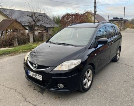 Черный Мазда 5, объемом двигателя 2 л и пробегом 230 тыс. км за 5500 $, фото 1 на Automoto.ua