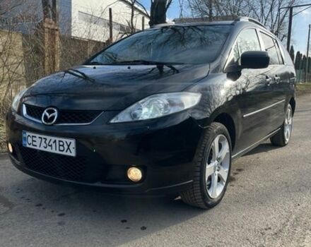Черный Мазда 5, объемом двигателя 2 л и пробегом 247 тыс. км за 4999 $, фото 1 на Automoto.ua