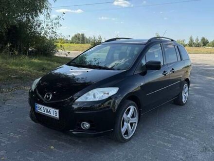 Черный Мазда 5, объемом двигателя 2 л и пробегом 249 тыс. км за 6500 $, фото 1 на Automoto.ua