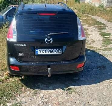 Черный Мазда 5, объемом двигателя 2 л и пробегом 229 тыс. км за 5200 $, фото 1 на Automoto.ua
