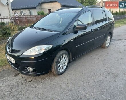 Черный Мазда 5, объемом двигателя 2 л и пробегом 247 тыс. км за 5999 $, фото 1 на Automoto.ua