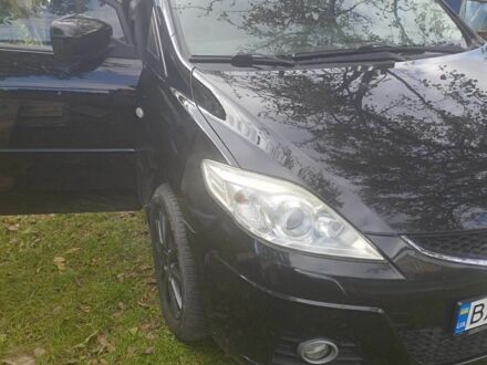 Черный Мазда 5, объемом двигателя 2 л и пробегом 240 тыс. км за 5500 $, фото 1 на Automoto.ua