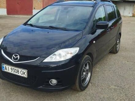 Черный Мазда 5, объемом двигателя 2 л и пробегом 300 тыс. км за 5600 $, фото 1 на Automoto.ua
