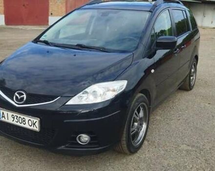 Черный Мазда 5, объемом двигателя 2 л и пробегом 300 тыс. км за 5600 $, фото 1 на Automoto.ua