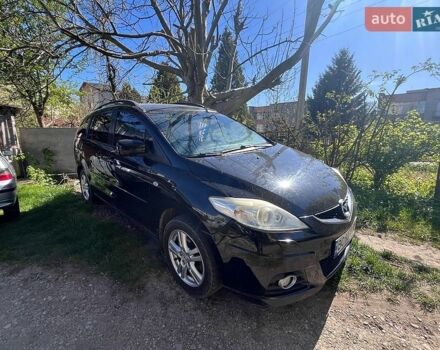Черный Мазда 5, объемом двигателя 2 л и пробегом 243 тыс. км за 6499 $, фото 1 на Automoto.ua