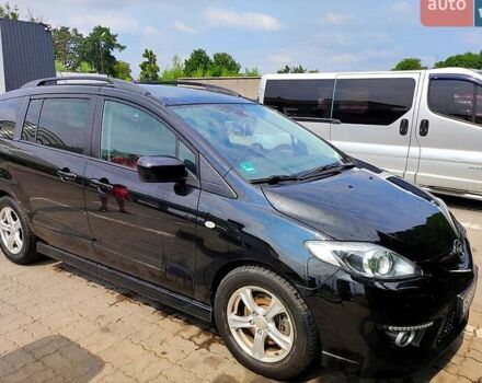 Черный Мазда 5, объемом двигателя 2 л и пробегом 265 тыс. км за 8900 $, фото 1 на Automoto.ua