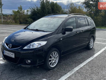 Черный Мазда 5, объемом двигателя 1.8 л и пробегом 240 тыс. км за 6400 $, фото 1 на Automoto.ua