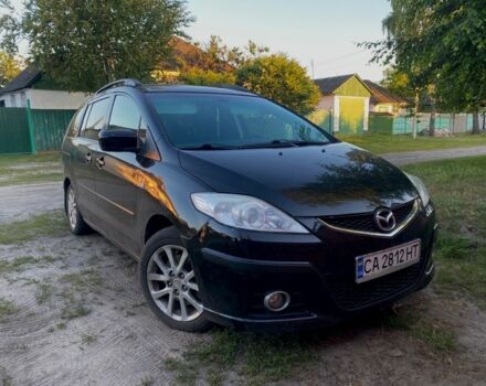 Черный Мазда 5, объемом двигателя 2 л и пробегом 219 тыс. км за 5999 $, фото 1 на Automoto.ua