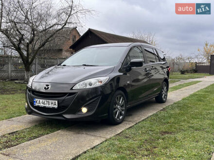 Черный Мазда 5, объемом двигателя 2 л и пробегом 231 тыс. км за 7699 $, фото 1 на Automoto.ua