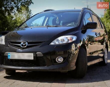 Черный Мазда 5, объемом двигателя 2 л и пробегом 225 тыс. км за 6650 $, фото 1 на Automoto.ua