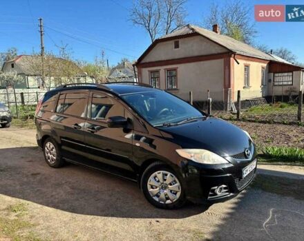 Черный Мазда 5, объемом двигателя 2 л и пробегом 285 тыс. км за 6800 $, фото 1 на Automoto.ua