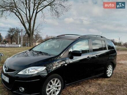 Черный Мазда 5, объемом двигателя 2 л и пробегом 246 тыс. км за 7500 $, фото 1 на Automoto.ua