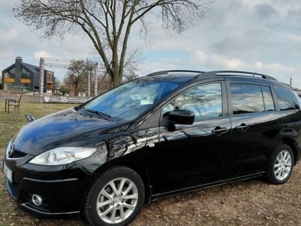 Черный Мазда 5, объемом двигателя 2 л и пробегом 250 тыс. км за 6598 $, фото 1 на Automoto.ua