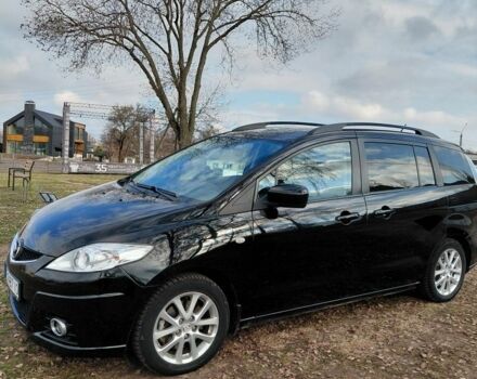 Черный Мазда 5, объемом двигателя 2 л и пробегом 250 тыс. км за 6595 $, фото 1 на Automoto.ua