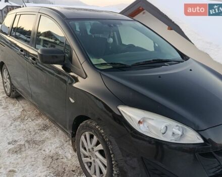 Черный Мазда 5, объемом двигателя 1.6 л и пробегом 333 тыс. км за 7000 $, фото 1 на Automoto.ua