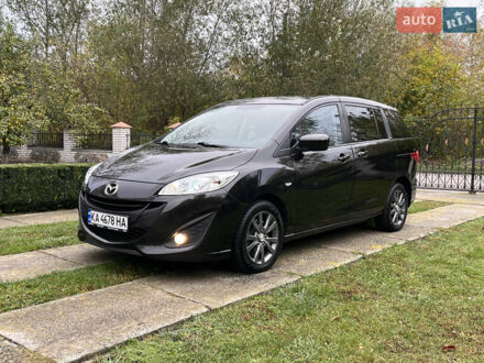 Черный Мазда 5, объемом двигателя 2 л и пробегом 231 тыс. км за 7999 $, фото 1 на Automoto.ua