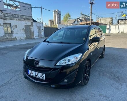 Черный Мазда 5, объемом двигателя 1.8 л и пробегом 235 тыс. км за 7100 $, фото 1 на Automoto.ua