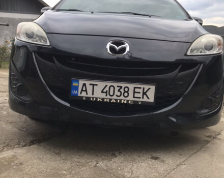 Черный Мазда 5, объемом двигателя 2.5 л и пробегом 143 тыс. км за 8100 $, фото 1 на Automoto.ua