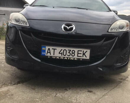 Черный Мазда 5, объемом двигателя 2.5 л и пробегом 143 тыс. км за 8100 $, фото 1 на Automoto.ua