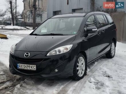 Черный Мазда 5, объемом двигателя 2.5 л и пробегом 156 тыс. км за 8600 $, фото 1 на Automoto.ua