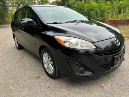 Черный Мазда 5, объемом двигателя 2.5 л и пробегом 85 тыс. км за 825 $, фото 1 на Automoto.ua