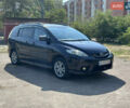 Фиолетовый Мазда 5, объемом двигателя 2 л и пробегом 200 тыс. км за 2999 $, фото 1 на Automoto.ua