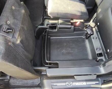 Фіолетовий Мазда 5, об'ємом двигуна 2 л та пробігом 228 тис. км за 7000 $, фото 4 на Automoto.ua